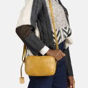 BURKELY Kožená mini crossbody kabelka Natural Norah 1000816.04.63 žltá