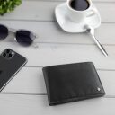 Bugatti pánska kožená peňaženka RFID Black Magic 49123701 čierna na stole